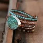 Pulsera para aliviar el estrés y la preocupación a través de su piedra natural de jaspe oceánico. El jaspe oceánico es una excelente piedra de curación que estimula un sentimiento de alegría y espíritu elevado.