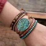 Pulsera para aliviar el estrés y la preocupación a través de su piedra natural de jaspe oceánico. El jaspe oceánico es una excelente piedra de curación que estimula un sentimiento de alegría y espíritu elevado.