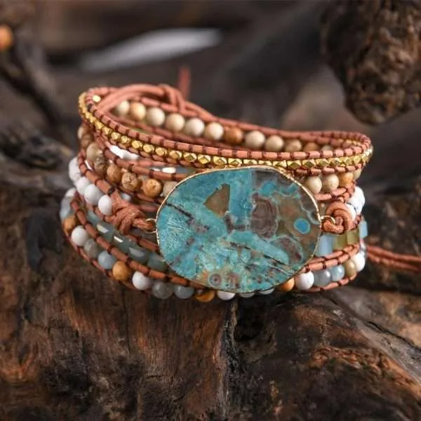 Pulsera para aliviar el estrés y la preocupación a través de su piedra natural de jaspe oceánico. El jaspe oceánico es una excelente piedra de curación que estimula un sentimiento de alegría y espíritu elevado.