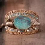 Pulsera para aliviar el estrés y la preocupación a través de su piedra natural de jaspe oceánico. El jaspe oceánico es una excelente piedra de curación que estimula un sentimiento de alegría y espíritu elevado.