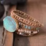 Pulsera para aliviar el estrés y la preocupación a través de su piedra natural de jaspe oceánico. El jaspe oceánico es una excelente piedra de curación que estimula un sentimiento de alegría y espíritu elevado.