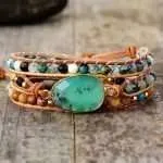 Pulsera del equilibrio y la suerte en el amor, elaborada a mano con piedras naturales (jade, ónix, turquesa africana y piedras volcánicas). El jade favorece la búsqueda del amor, la suerte y la estabilidad emocional.