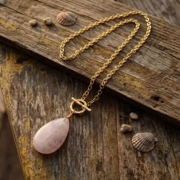 Collar de la paz infinita en forma de lágrima de cuarzo rosa