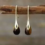 Pendientes del dulce camino con piedras naturales variadas