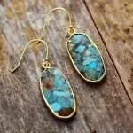 Pendientes de la liberación de inhibiciones con piedras de turquesa