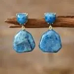 Pendientes de la limpieza del aura con piedras de amatista u ojo de tigre