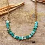 Colgante boho del autocontrol con piedras de ónix y semillas