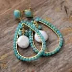 Pendientes del crecimiento del amor puro con perlas de agua dulce y piedras