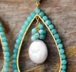 Pendientes del crecimiento del amor puro con perlas de agua dulce y piedras