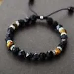 Pulsera bohemia unisex con piedras naturales de ónix negro y ojo de tigre