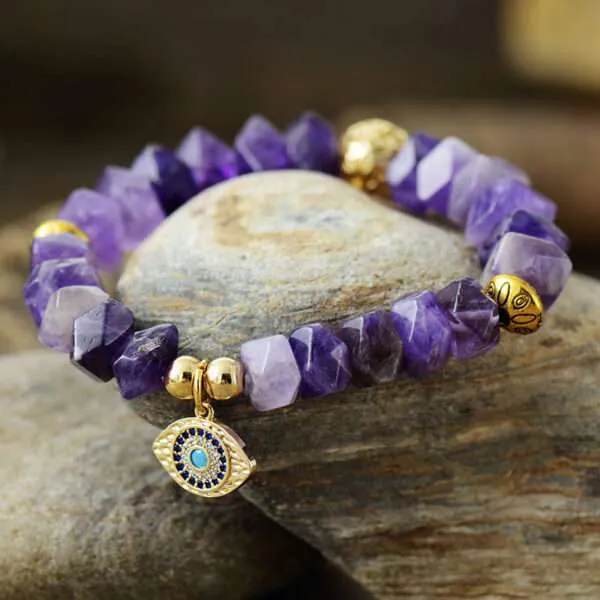 Pulsera del simbolito poderoso y piedras de amatista, lapislázuli o turquesa africana
