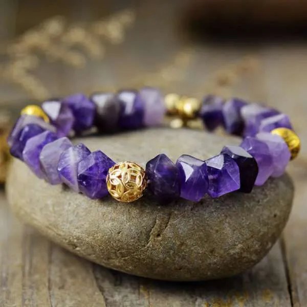 Pulsera del simbolito poderoso y piedras de amatista, lapislázuli o turquesa africana