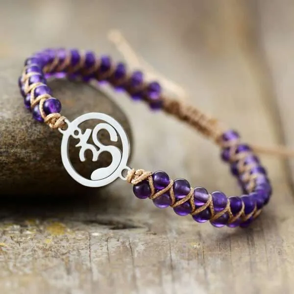 Pulsera símbolo OM de la unidad con lo supremo con amatista