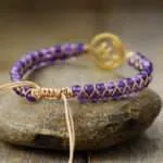 Pulsera símbolo OM de la unidad con lo supremo con amatista