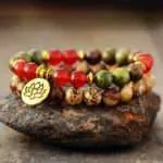 Pulsera espiritual con piedras de cornalina, unakita, jaspe y flor de loto