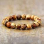 Pulsera espiritual con piedras de cornalina, unakita, jaspe y flor de loto