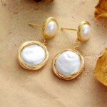 Pendientes boho del equilibrio en el pensamiento con perlas de agua dulce
