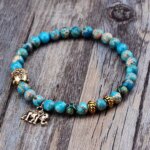 Pulsera budista con símbolo Buda y Ganesha con cuentas de jaspe