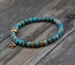 Pulsera budista con símbolo Buda y Ganesha con cuentas de jaspe