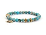 Pulsera budista con símbolo Buda y Ganesha con cuentas de jaspe