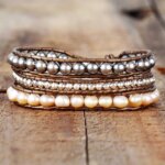 Pulsera elegante del vaivén de las olas con perlas de agua dulce y hematita