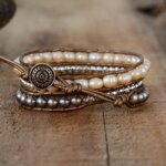 Pulsera elegante del vaivén de las olas con perlas de agua dulce y hematita