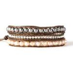 Pulsera elegante del vaivén de las olas con perlas de agua dulce y hematita