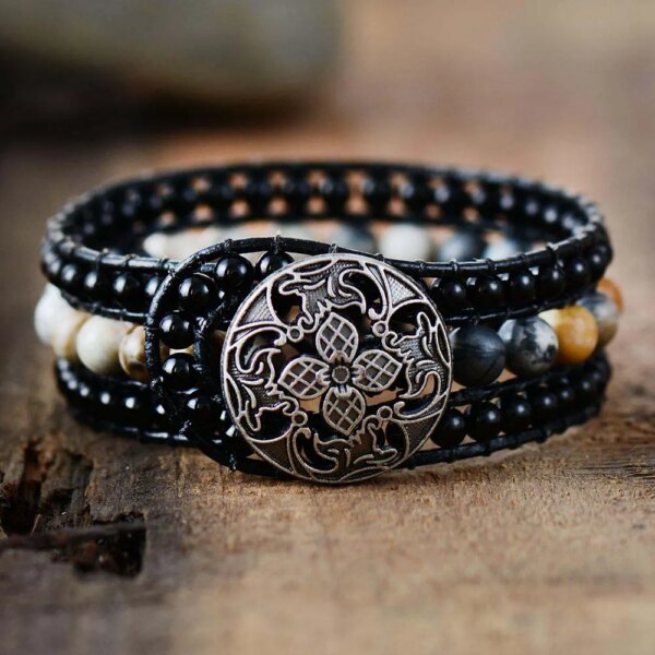 Pulsera vintage de estilo modernista con motivos florales y ónix negro