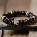 Pulsera zen con dije budista y piedras medicinales de broncita