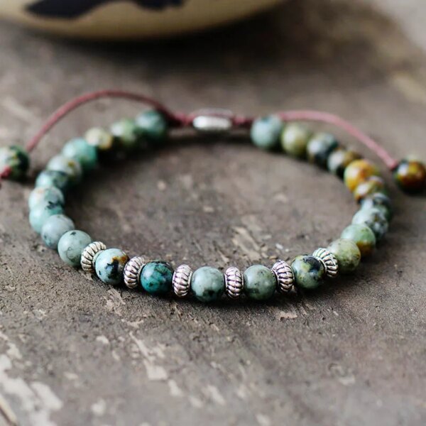 Pulsera unisex de la evolución con turquesa africana o ágata negra