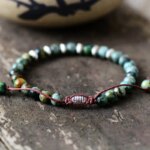 Pulsera unisex de la evolución con turquesa africana o ágata negra