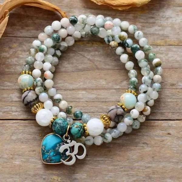 Collar símbolo 'OM' de la precognición con corazón de jaspe y ágata árbol