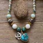 Collar símbolo 'OM' de la precognición con corazón de jaspe y ágata árbol