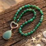 Collar de la energía protectora con piedras ojo de tigre, ónix o cuarzo fresa