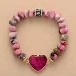 Pulsera de armonía emocional con rodonita, corazón de jade y dije OM