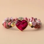 Pulsera de armonía emocional con rodonita, corazón de jade y dije OM