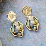 Pendientes bohemios "mar y montaña" con flores de perlas de agua dulce