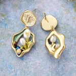 Pendientes bohemios "mar y montaña" con flores de perlas de agua dulce