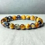 Pulsera Horizonte – Con Piedras de Ojo de Tigre Azul y Dorado 5A+