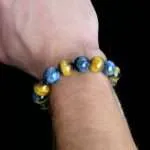 Pulsera Horizonte – Con Piedras de Ojo de Tigre Azul y Dorado 5A+