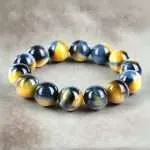 Pulsera Horizonte – Con Piedras de Ojo de Tigre Azul y Dorado 5A+