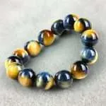 Pulsera Horizonte – Con Piedras de Ojo de Tigre Azul y Dorado 5A+