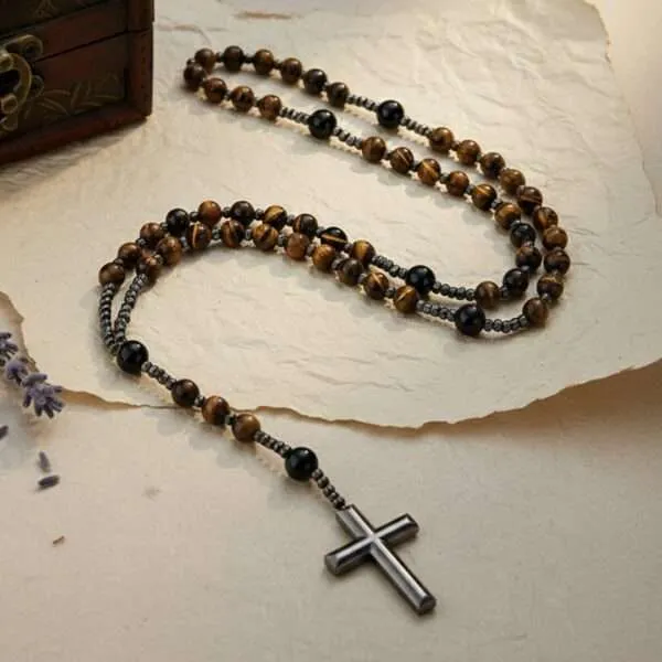 Rosario artesanal de Ojo de Tigre y Ónix Negro con cruz de Hematita